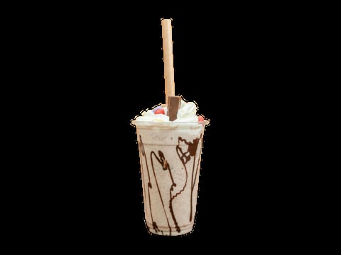 Iced beverage in a clear cup with chocolate drizzle, whipped cream topping, and a wooden stirrer on black background